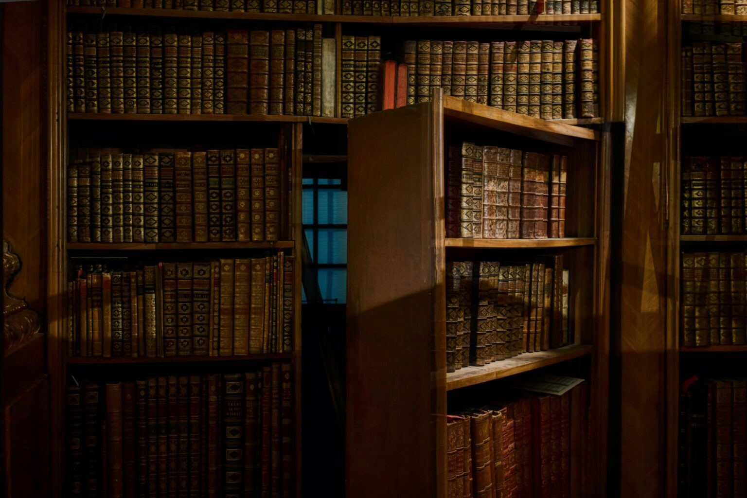 An antiquated library bookshelf swings out, acting as hidden doors in walls to reveal a secret dark room on the other side. As inspectors might see when inspecting houses with secret rooms and passageways, these spaces can be tricky to find.